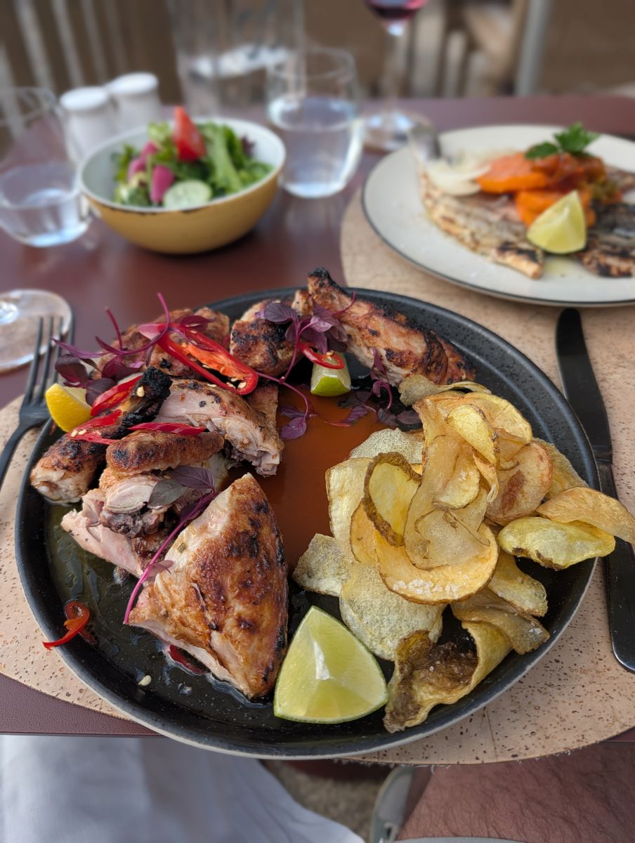 Grilled chicken and fish with chips — dinner at Octant