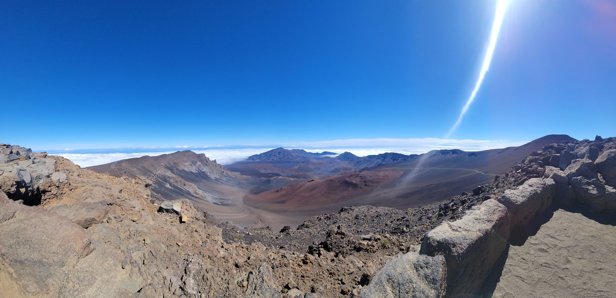 Panoramic view into Haleakalā crater from the summit at 10,023 feet, above the clouds, Upcountry Maui