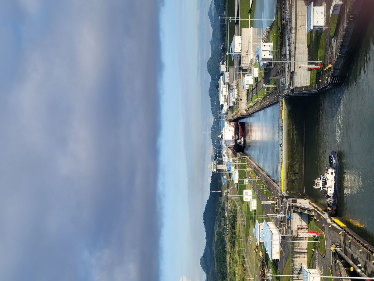 Looking down the Cocolí Locks with a tanker ship and tugboat below