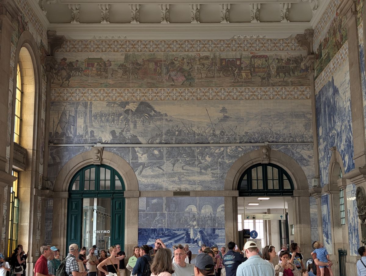 The famous azulejo tile panels lining the walls of São Bento railway station